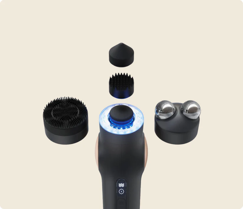 Un dispositivo de cuidado de la piel negro con accesorios y luz LED azul.
