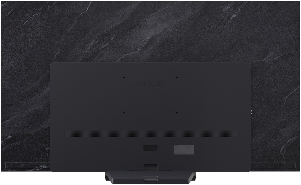 Achterkant van een zwarte LG OLED TV tegen een zwarte marmeren achtergrond.