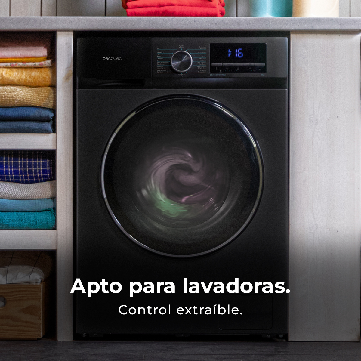 Una lavadora negra con panel de control y tambor giratorio.