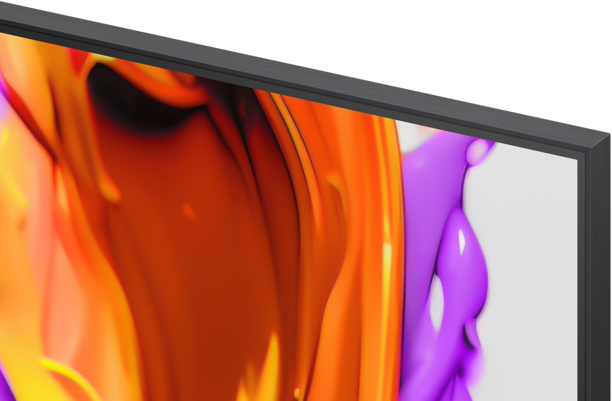 A close-up of a television screen displaying abstract art in orange and purple.