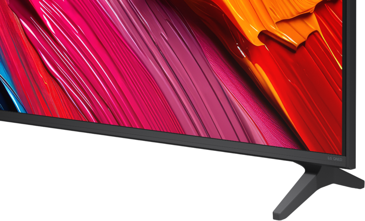 A TV displaying vibrant pink and orange colors on screen, with a black stand.