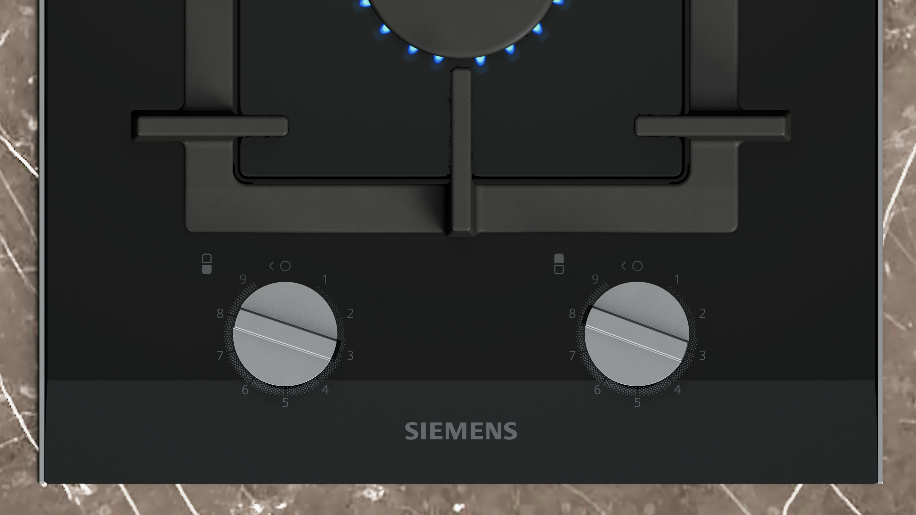 Ein schwarzer Siemens Gasherd mit zwei Knöpfen und blauen Flammen.