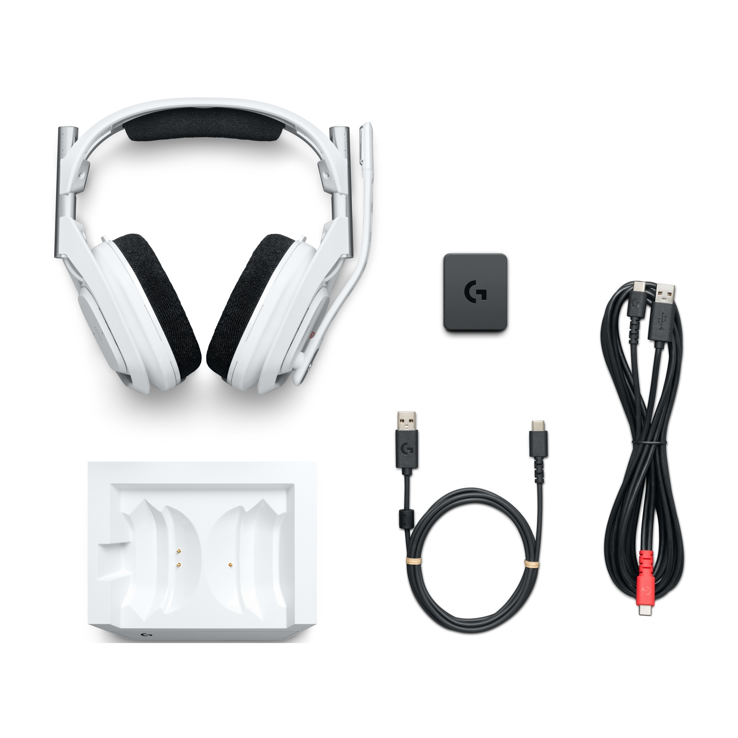 Cuffie da gaming bianche con imbottitura nera, base di ricarica, dongle e cavi.