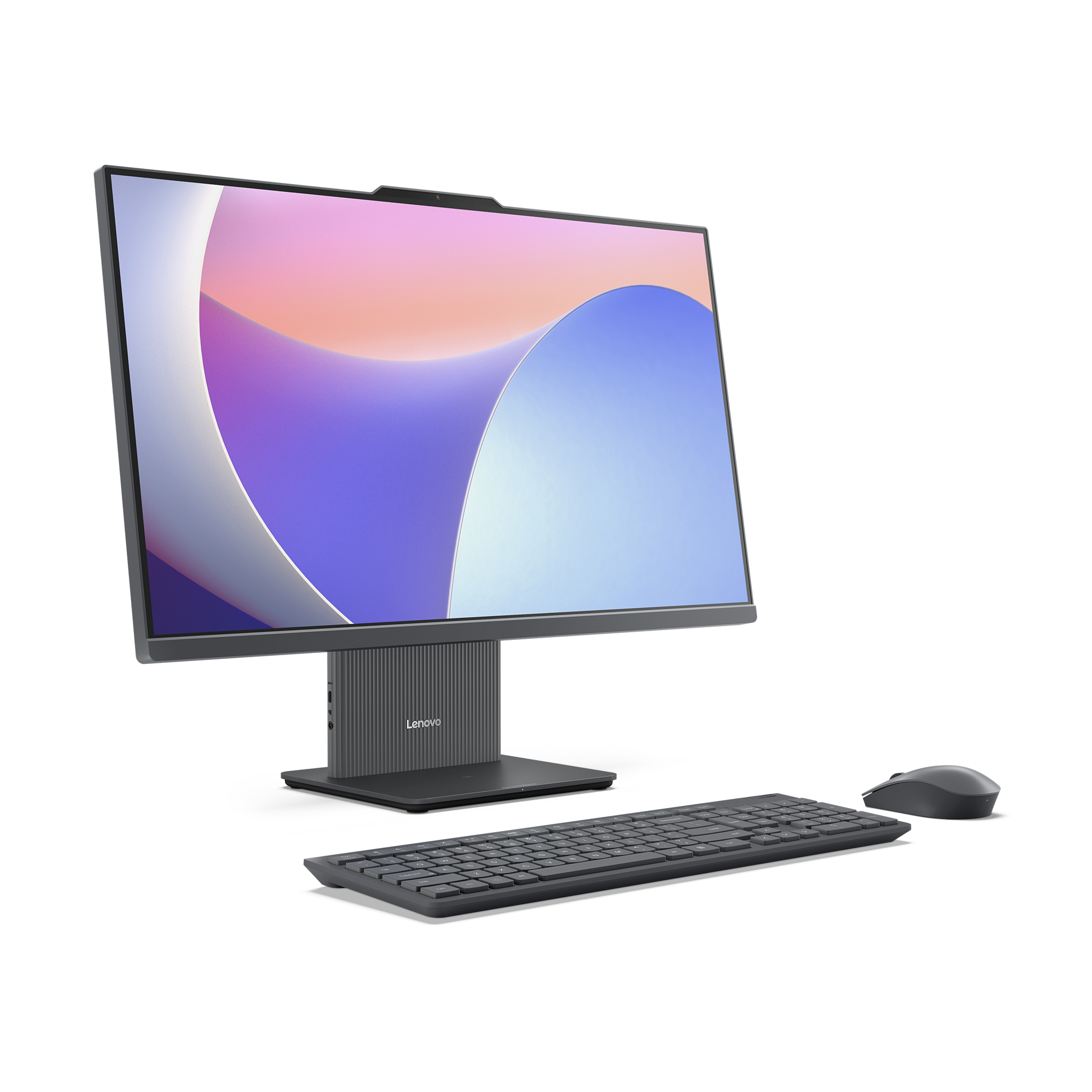 Un ordinateur tout-en-un Lenovo gris avec clavier et souris sur fond sombre.