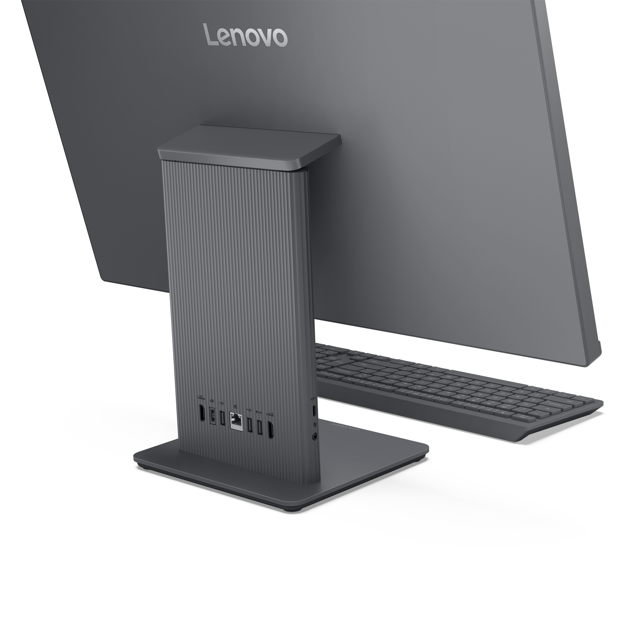 PC tout-en-un Lenovo gris avec clavier, ports visibles sur la base.
