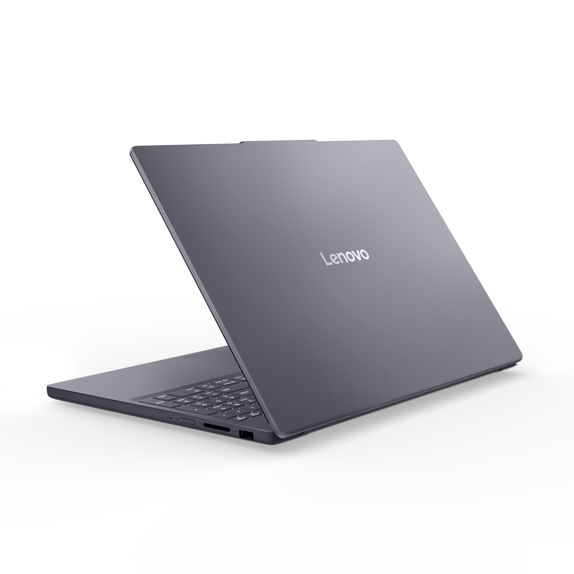 Un ordinateur portable Lenovo gris fermé sur fond noir.