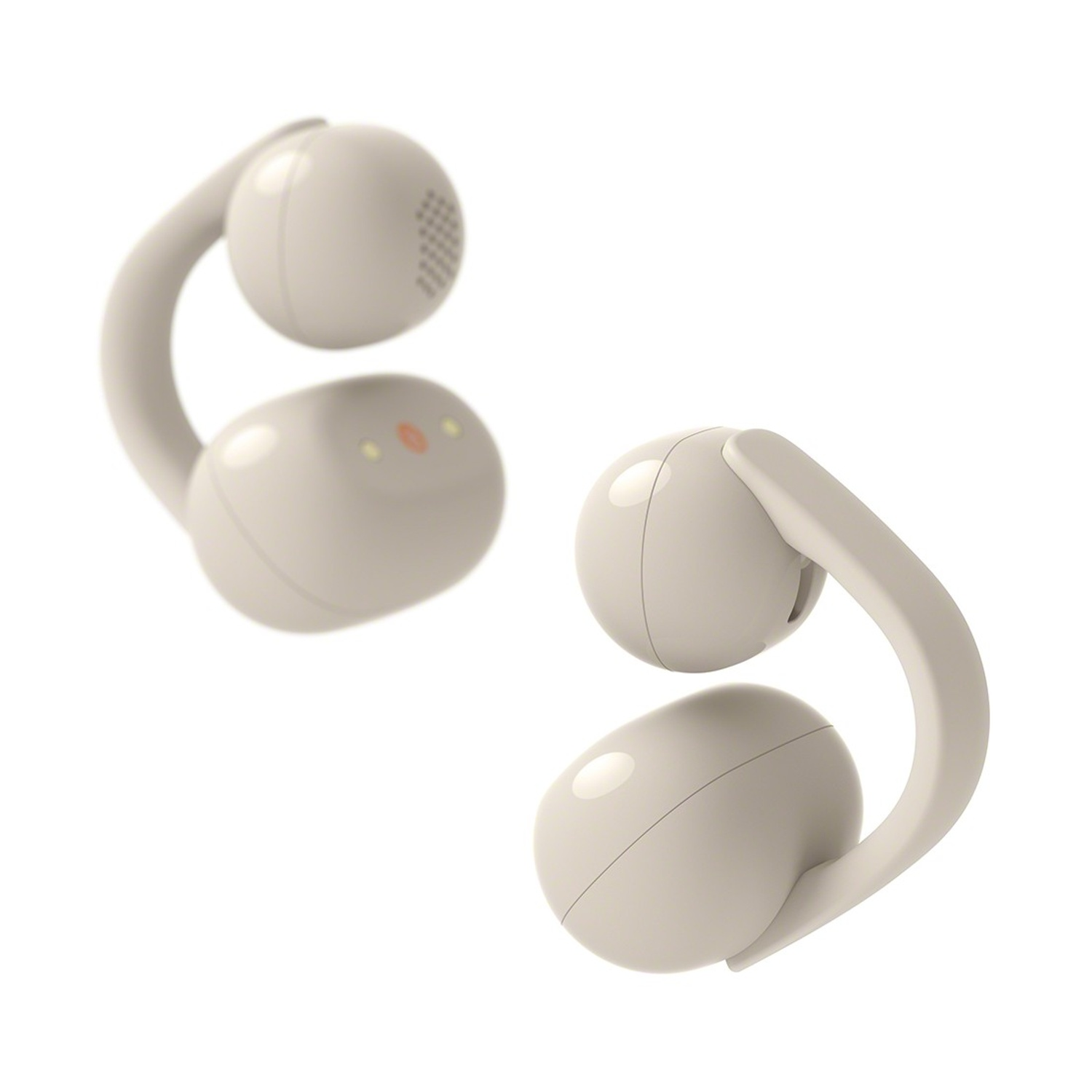 Due auricolari beige dall'aspetto futuristico uno accanto all'altro su sfondo bianco.