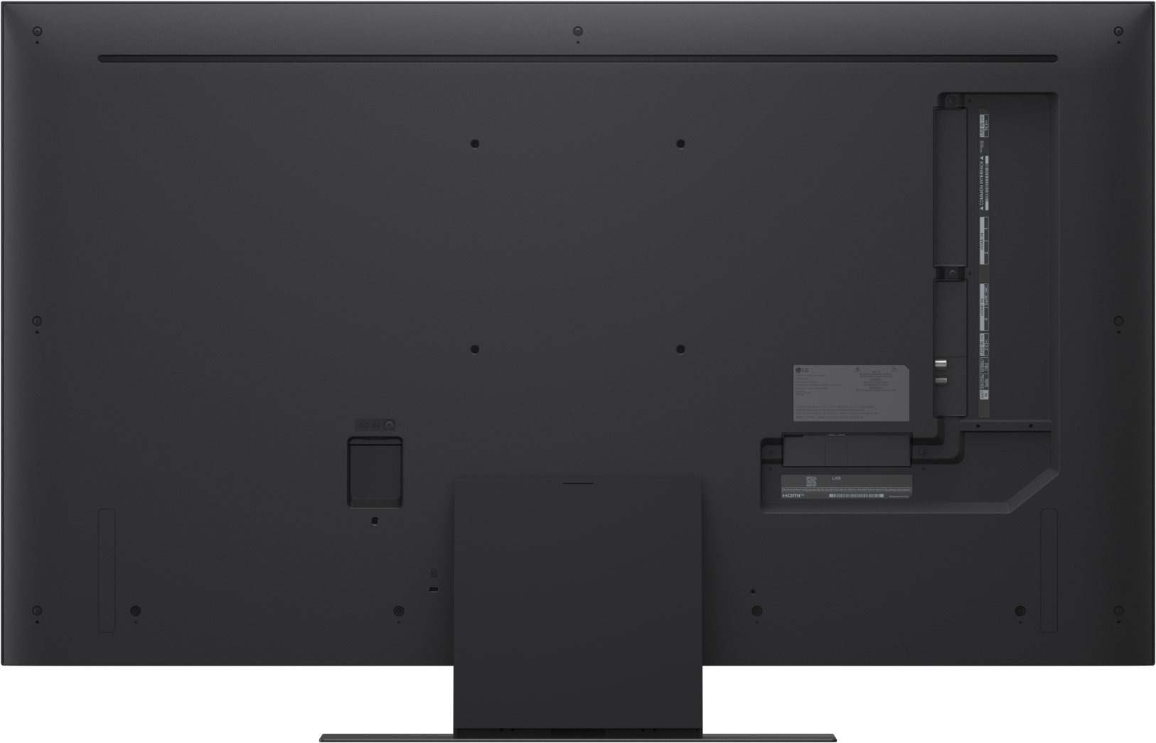 Back of a black television with ports and a stand.