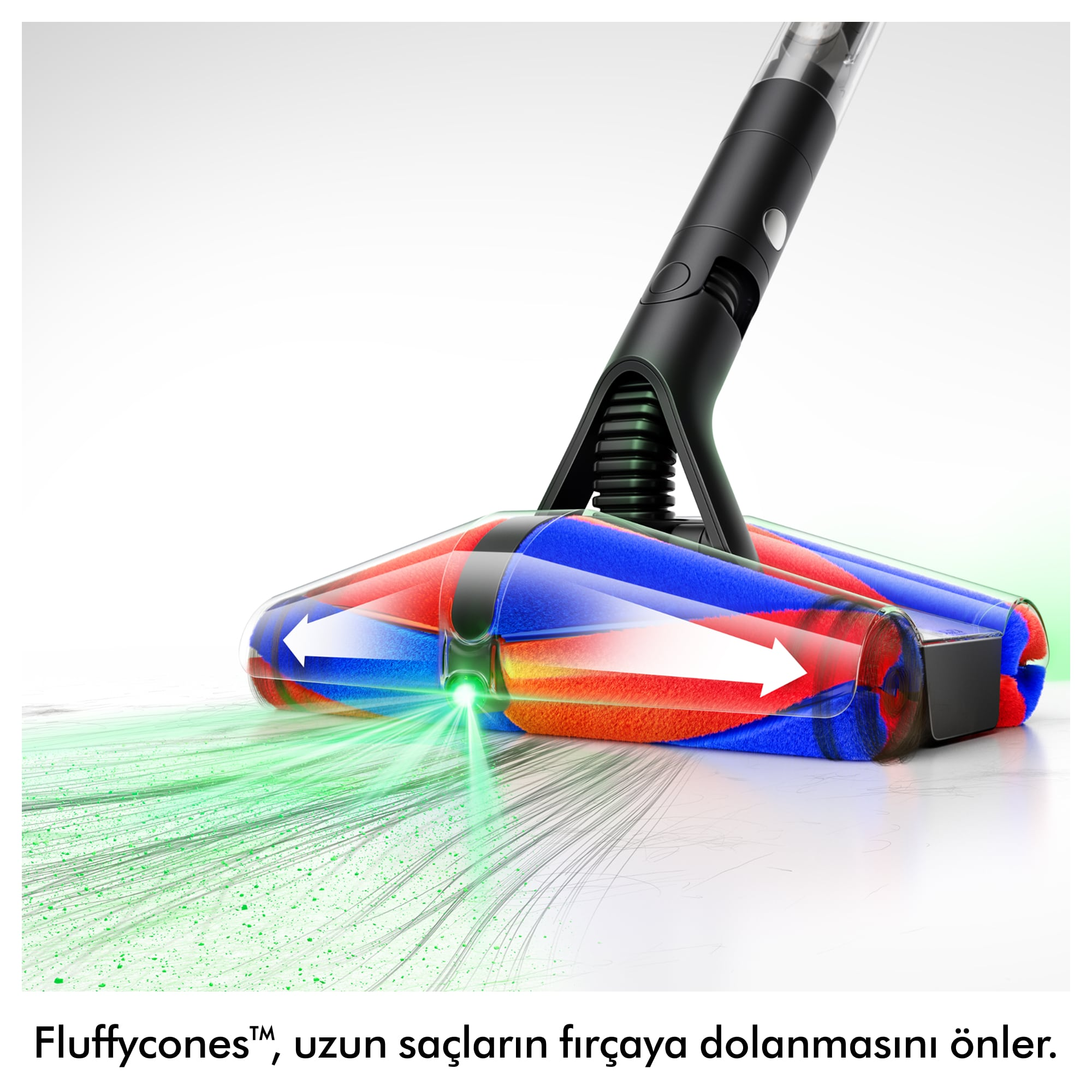 Kırmızı ve mavi dönen rulolu, yeşil ışıkla aydınlatılmış elektrikli süpürge başlığı.