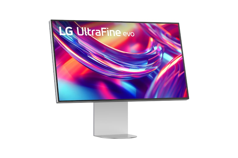 Monitor LG UltraFine z kolorowym, abstrakcyjnym tłem.