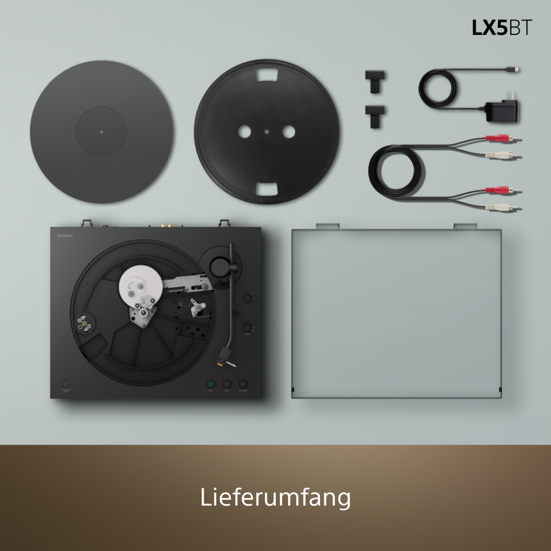 Plattenspieler mit Zubehör: Plattenteller, Abdeckung, Kabel, Netzteil, Adapter.