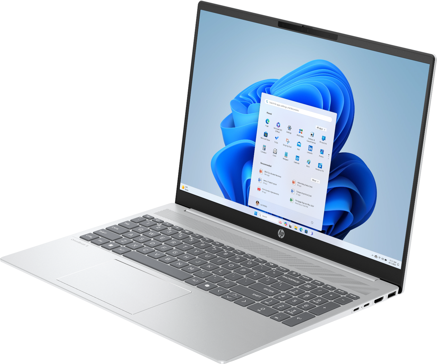 A silver HP laptop displaying Windows 11 on its screen.