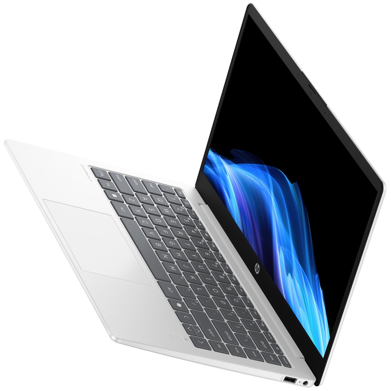 A white laptop with an open screen displaying a blue abstract pattern.