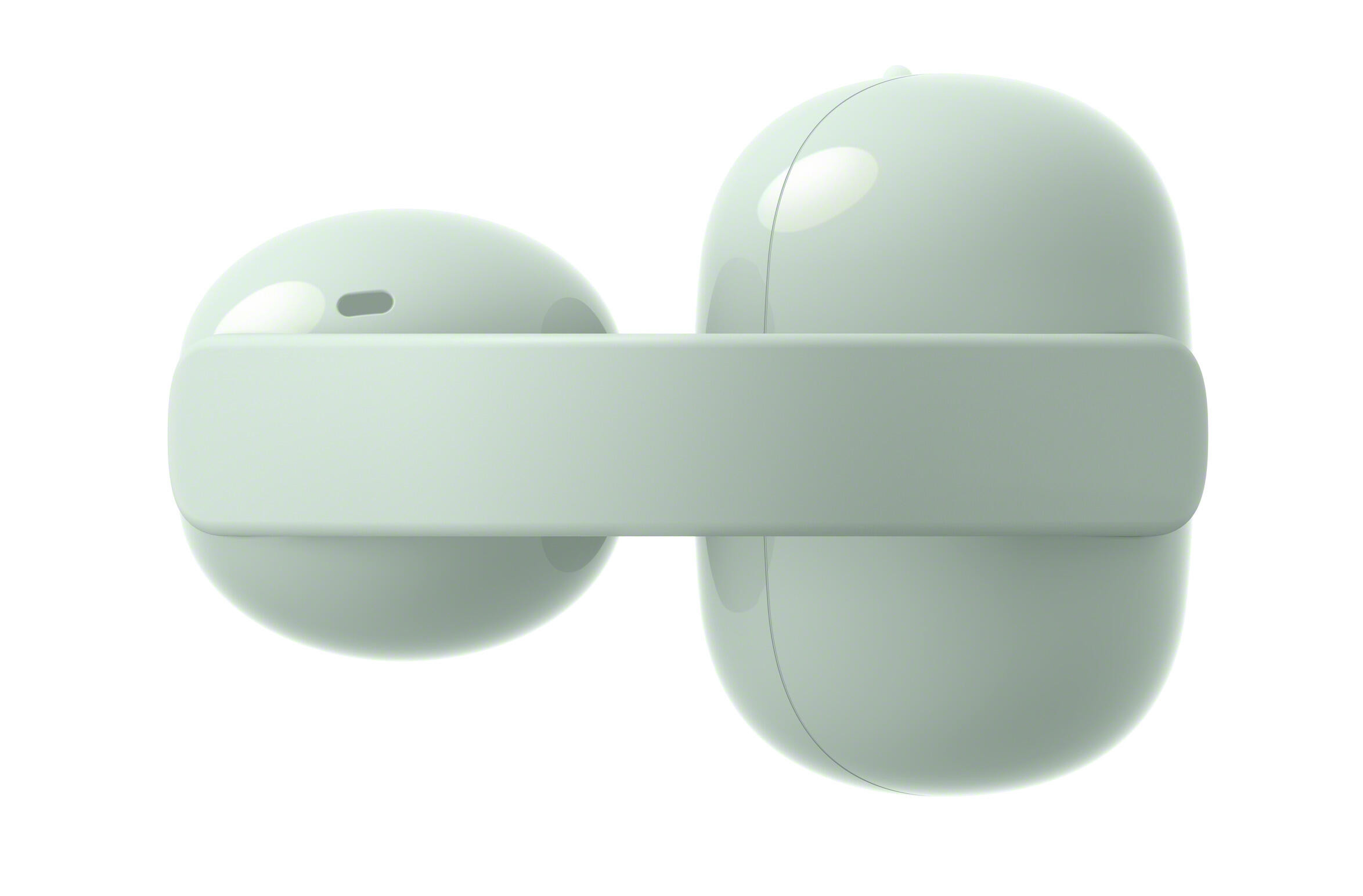 Dwa jasnozielone słuchawki bezprzewodowe na białym tle.