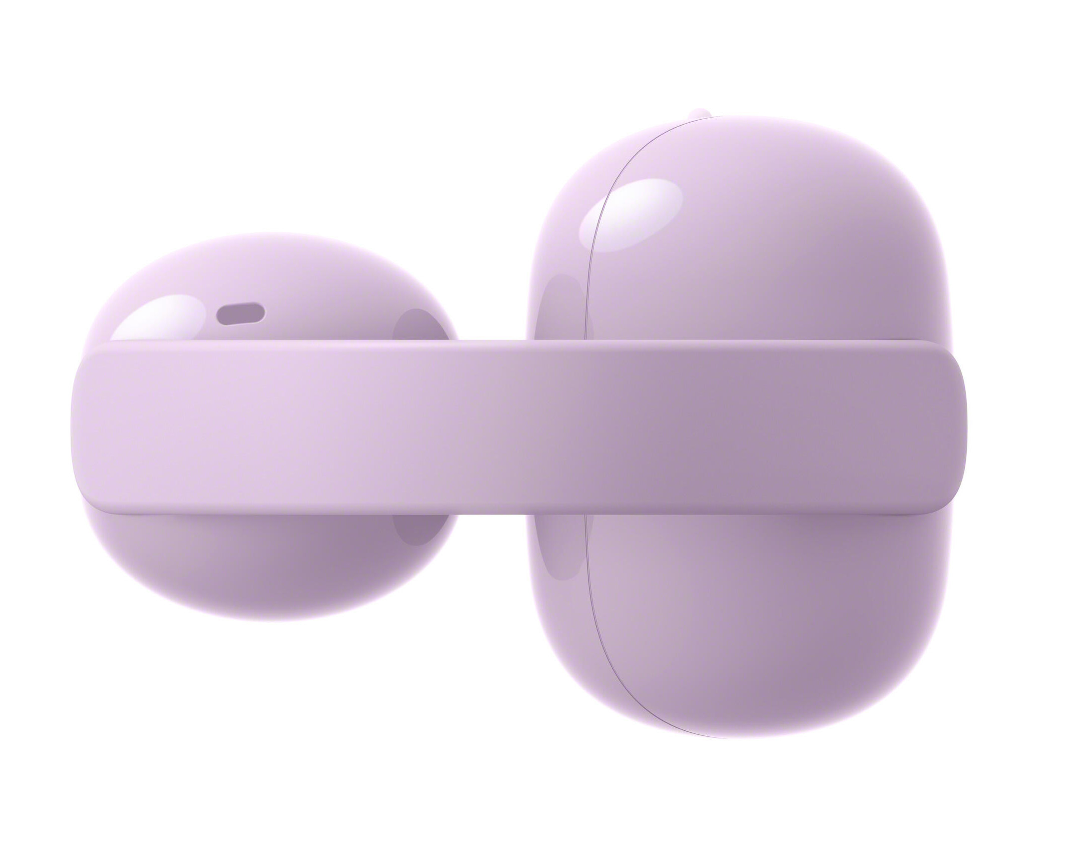 Fioletowe słuchawki bezprzewodowe z etui ładującym na białym tle.