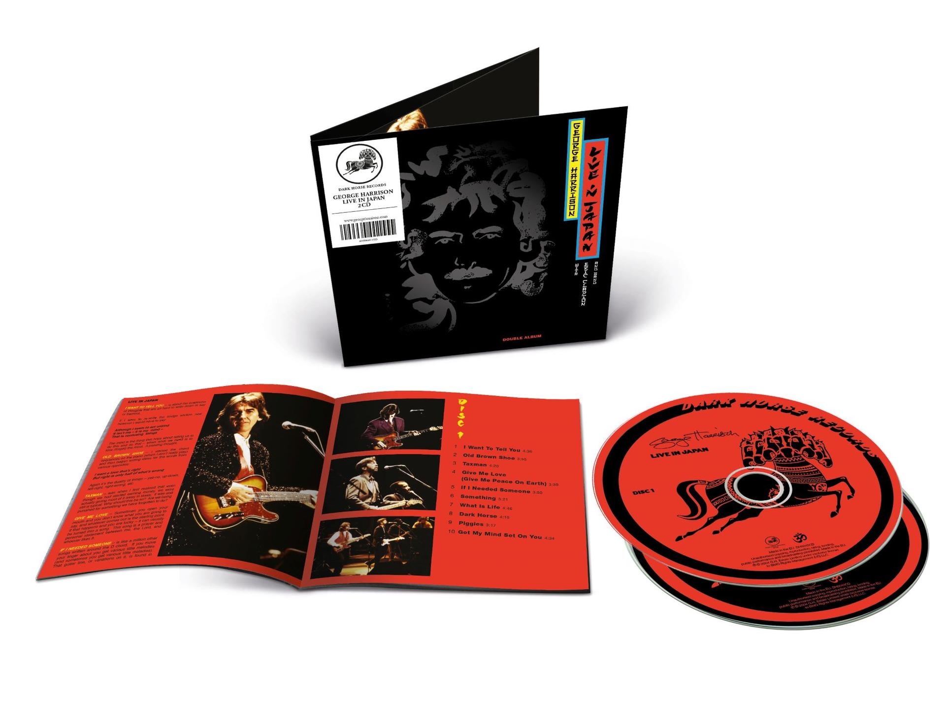 George Harrison Live in Japan CD-Set mit Booklet und zwei roten CDs mit Artwork.