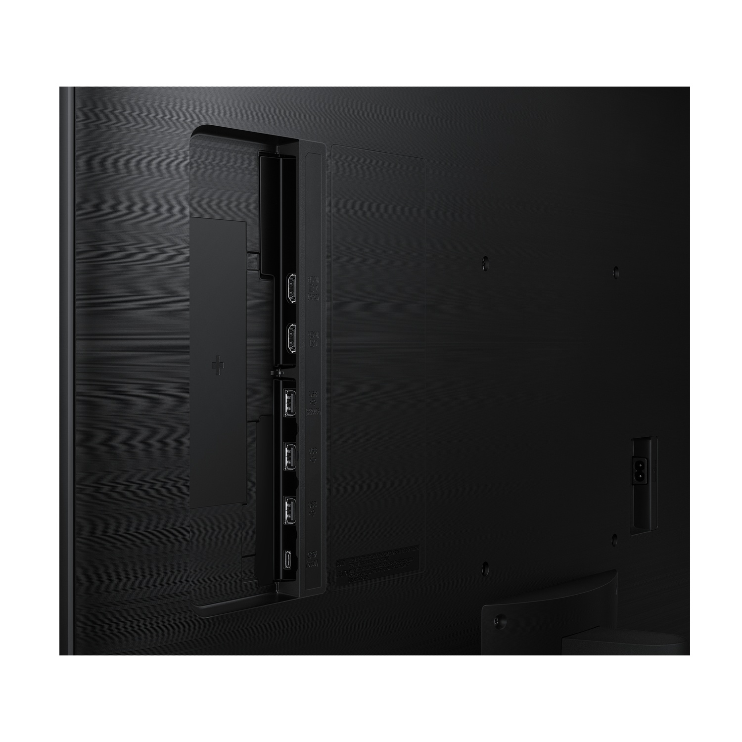 Retro di un televisore nero con porte come HDMI e USB.