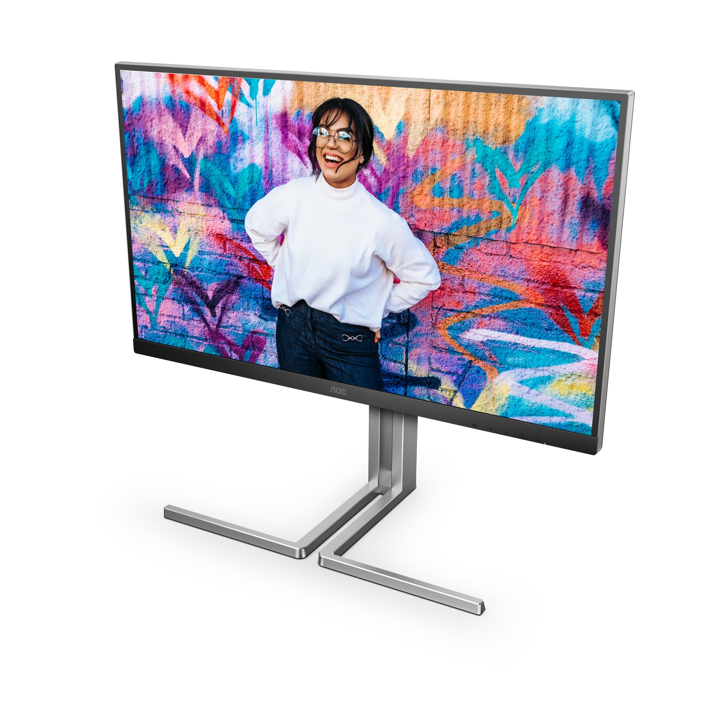 Monitor con donna che ride su sfondo graffiti colorato.