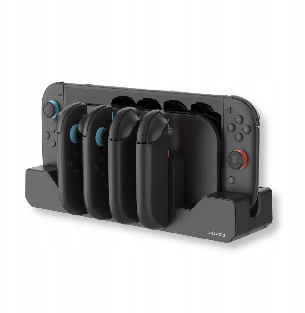 Czarna stacja dokująca z konsolą Nintendo Switch i czterema kontrolerami Joy-Con.