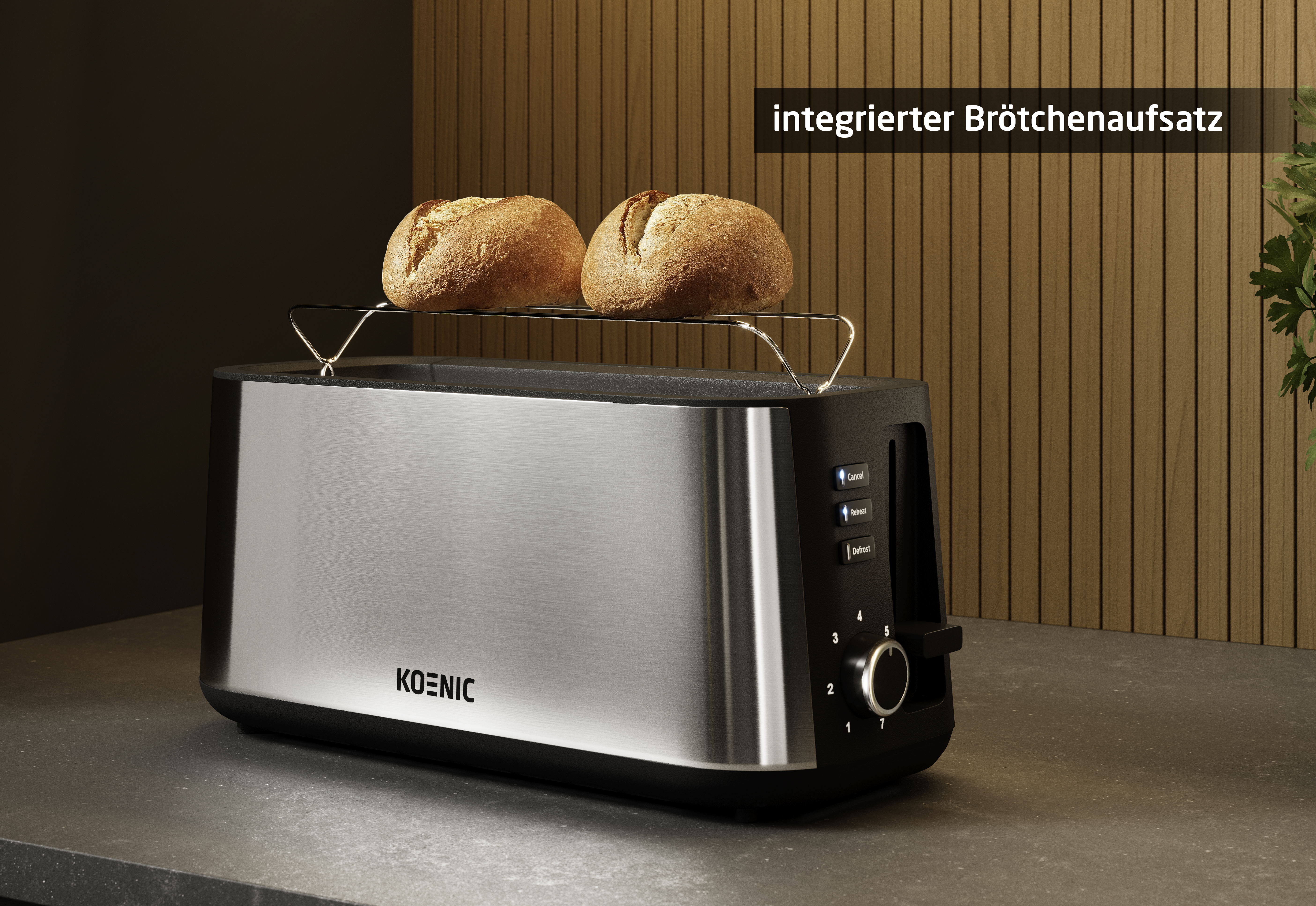 Ein Toaster mit Brötchenaufsatz und zwei Brötchen auf der Oberseite.