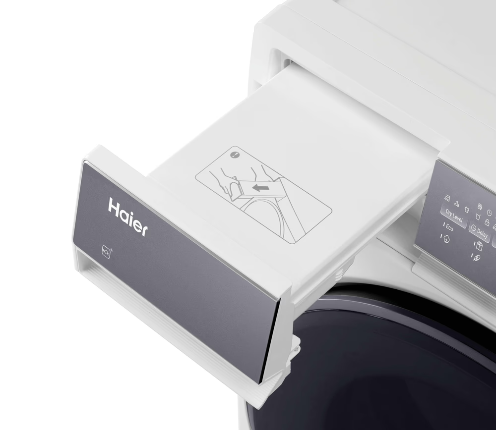 Egy kihúzható fiók egy fehér Haier mosógépen ikonokkal.