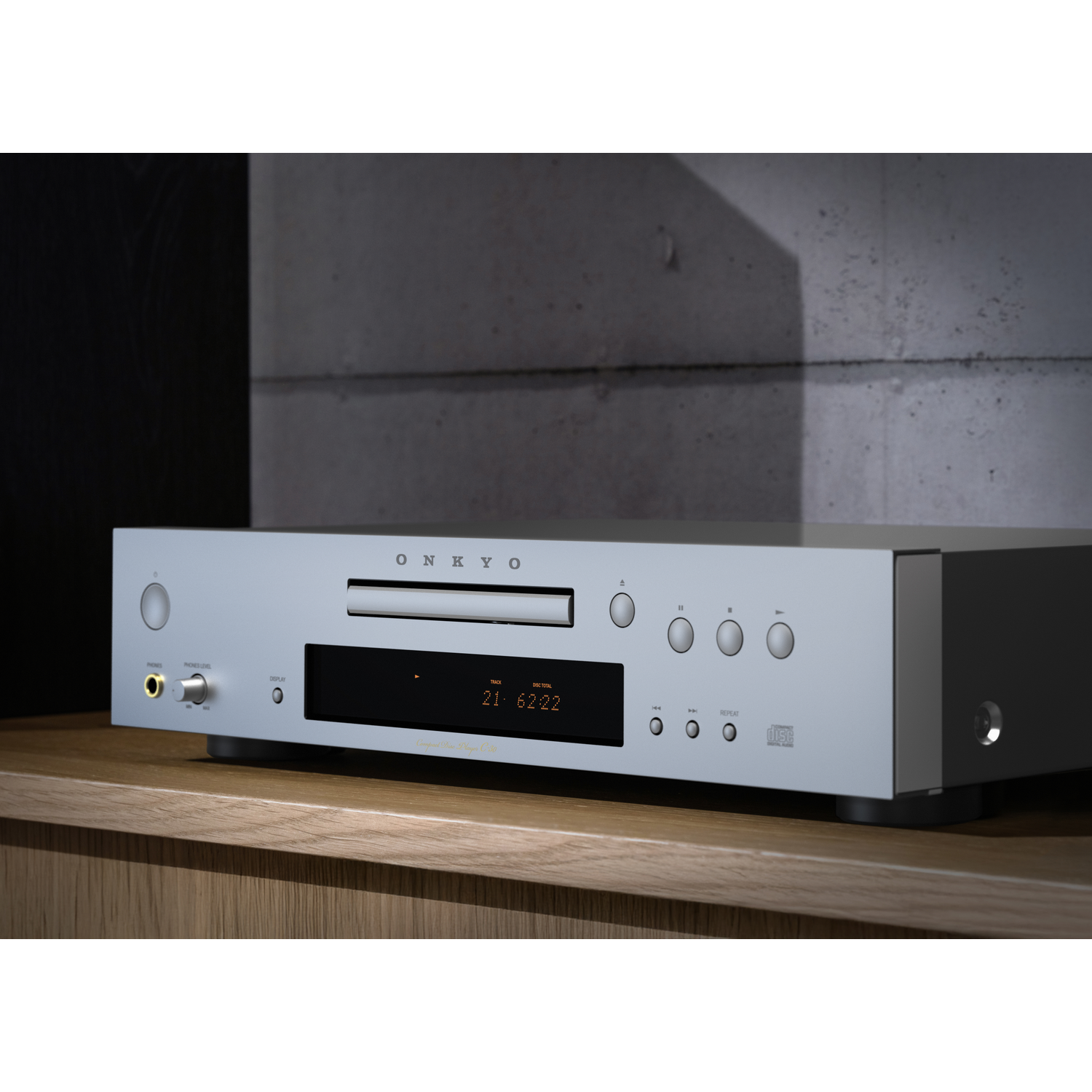 Silver Onkyo CD player with orange display on a wooden shelf.