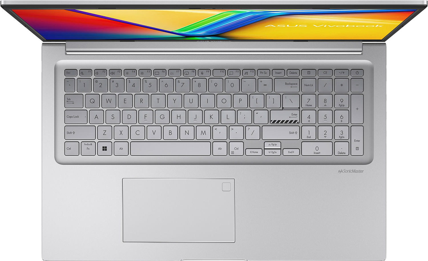 Ezüst laptop nyitott fedéllel, billentyűzettel és érintőpaddal.