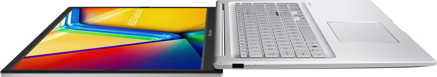 Ezüst laptop nyitott képernyővel, színes absztrakt mintával.