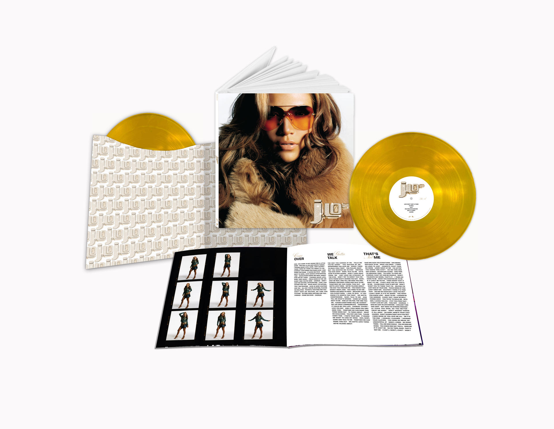 Goldene Schallplatten, ein Albumcover mit einer Frau und eine Hülle mit Muster.