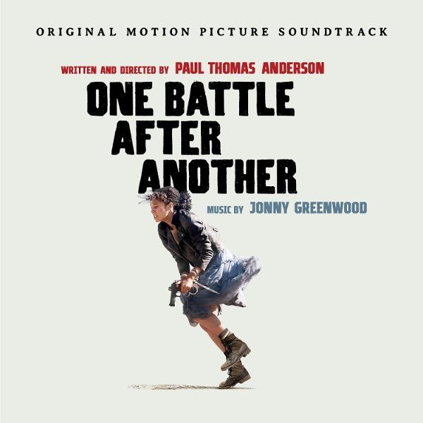 Nő fegyverrel fut, "One Battle After Another" cím