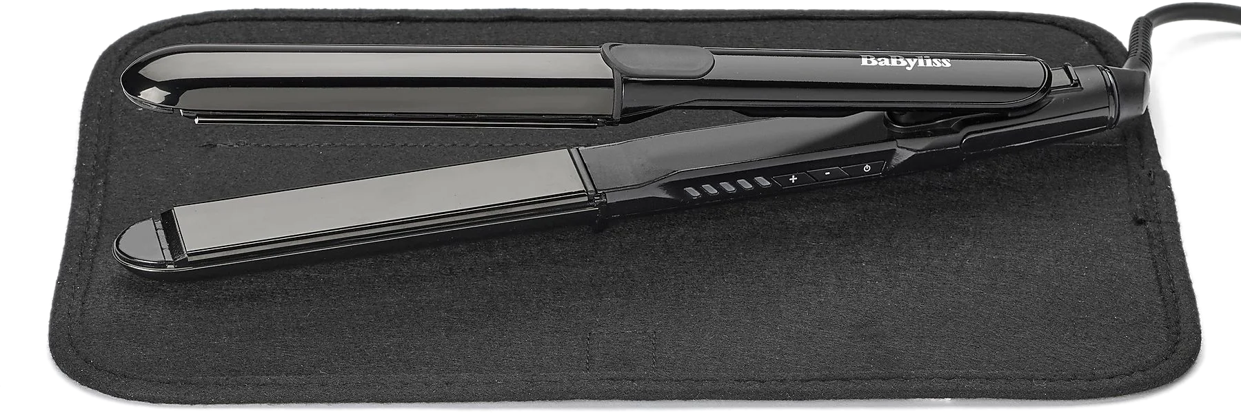 Schwarzer Babyliss Glätteisen auf schwarzer Matte. Mit Bedienelementen.