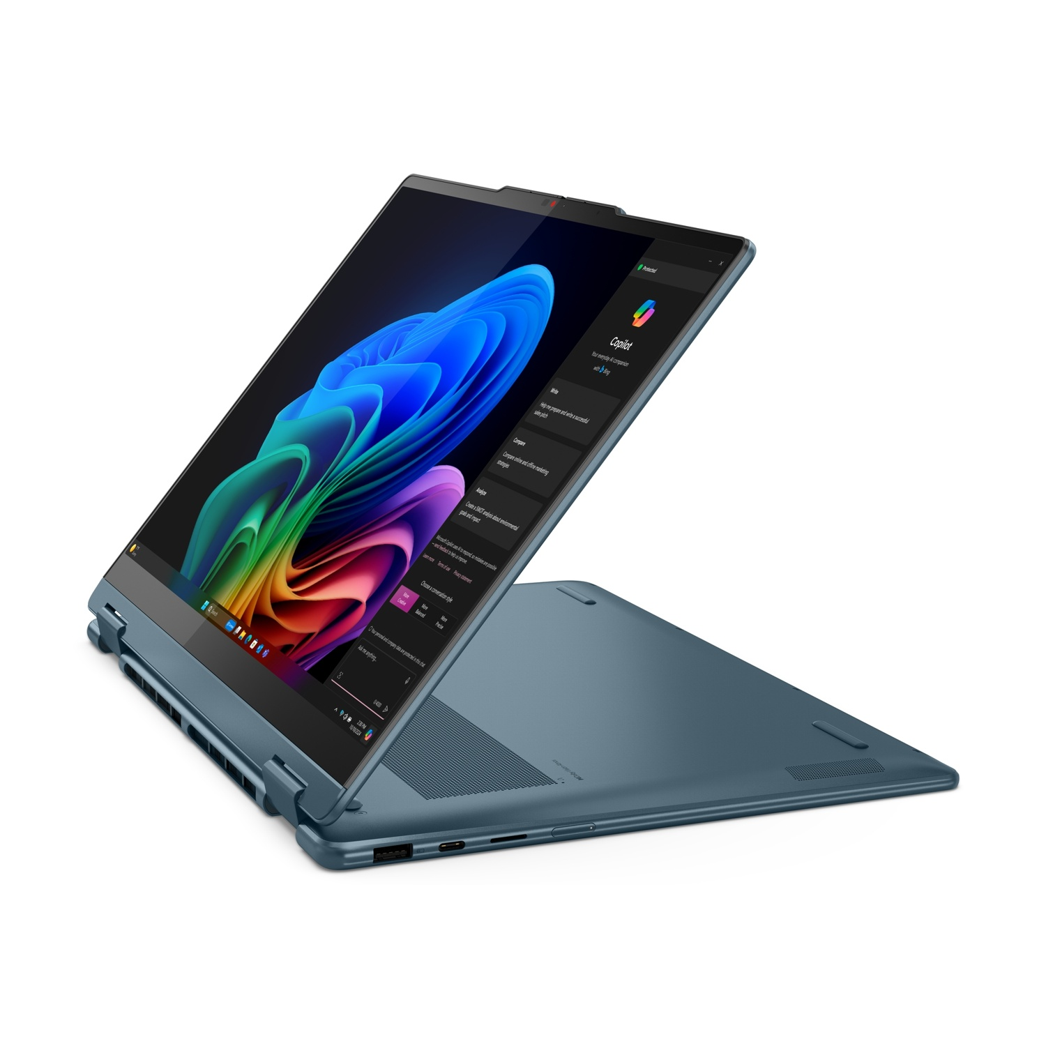 Un laptop blu aperto che mostra uno sfondo colorato sullo schermo.