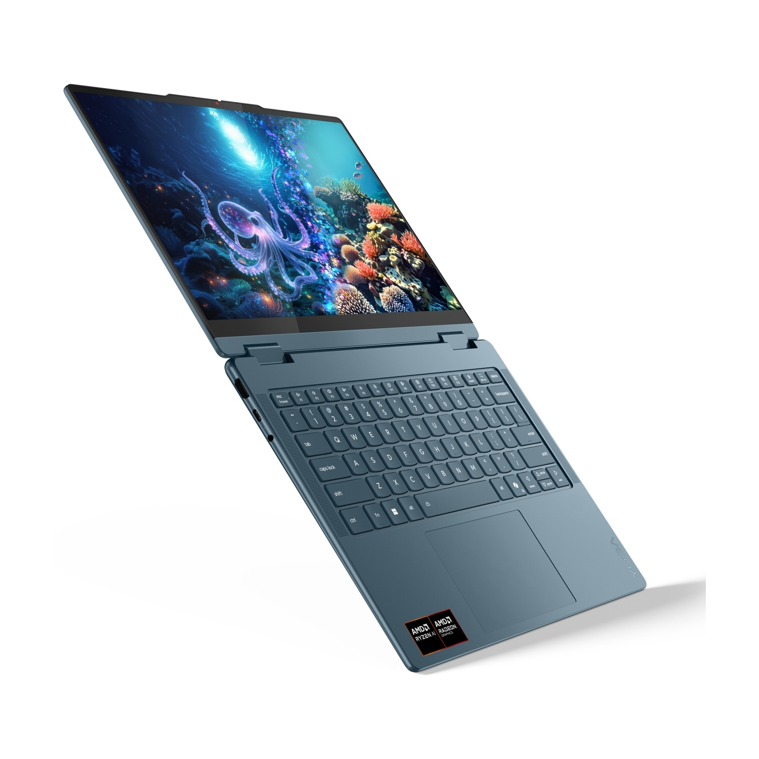 Un laptop blu con sfondo schermo polpo. Primo piano della tastiera.