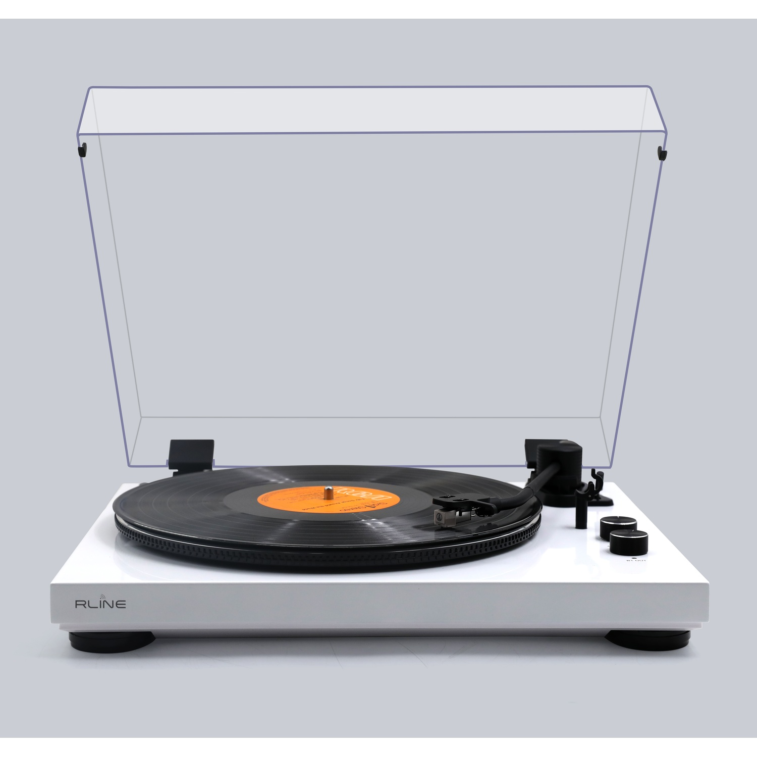 Giradischi bianco con disco in vinile e coperchio trasparente.