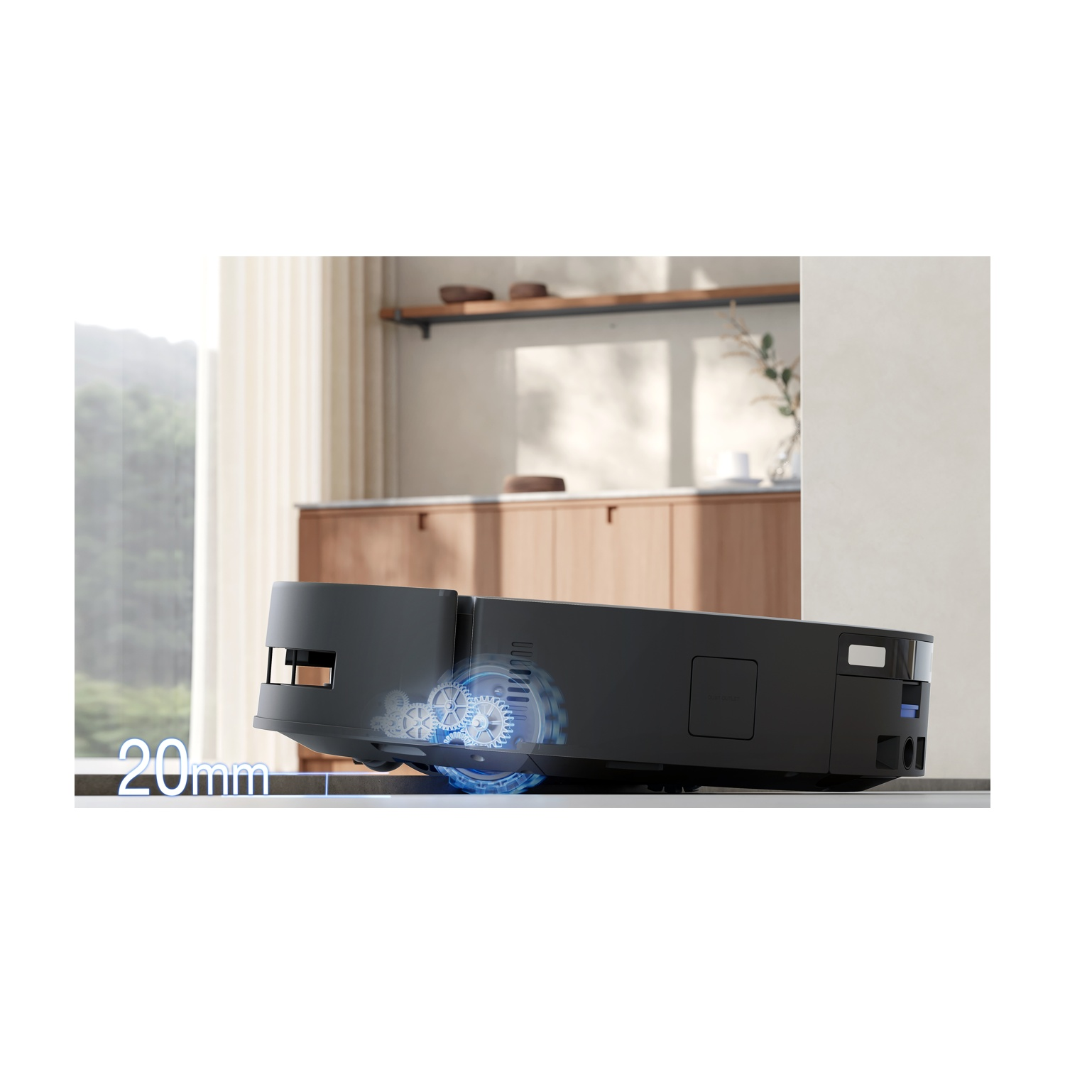 Robot aspirapolvere nero con ingranaggi visibili e scritta 20mm.