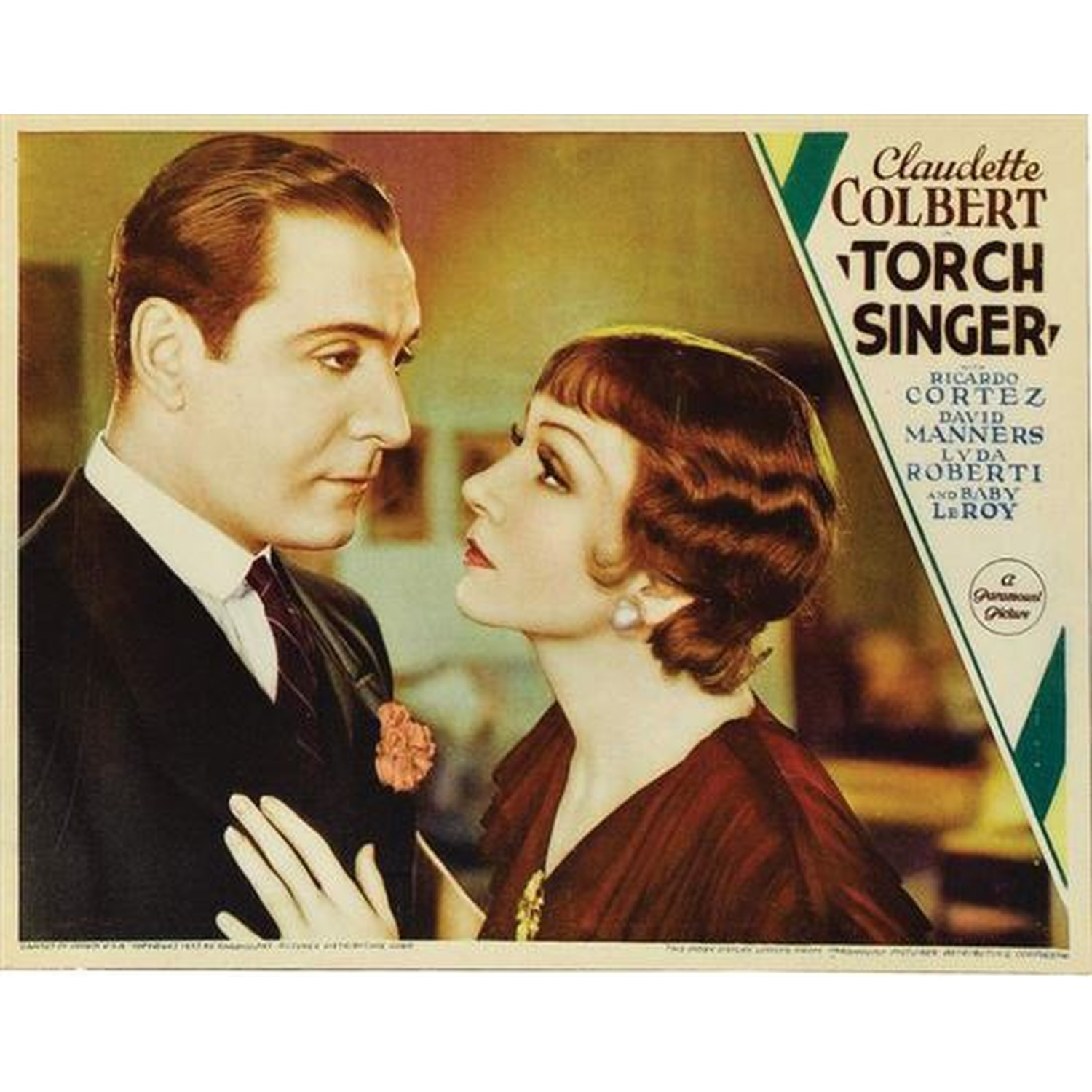 Een man en vrouw kijken elkaar aan. Filmaffiche voor 'Torch Singer'.
