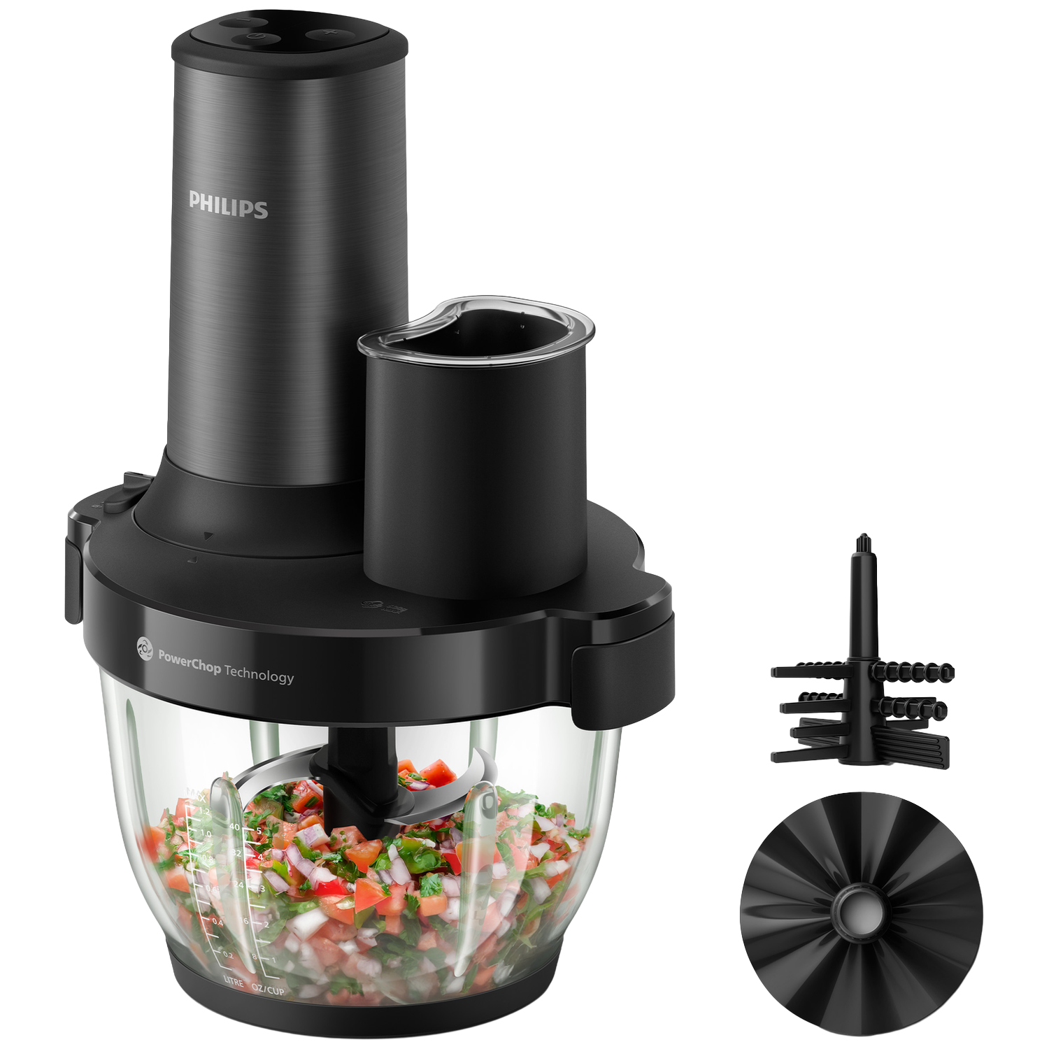Robot culinaire Philips noir avec légumes hachés dans le bol et accessoires.