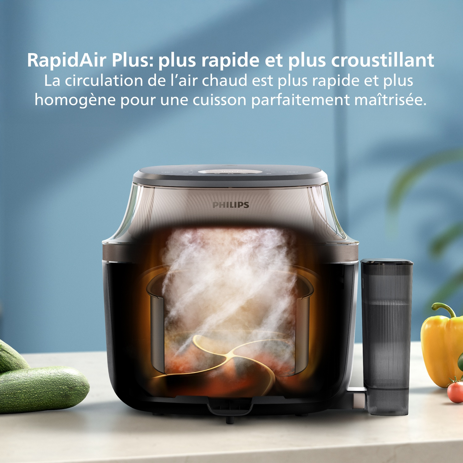 Une friteuse à air chaud avec de la vapeur et des légumes.