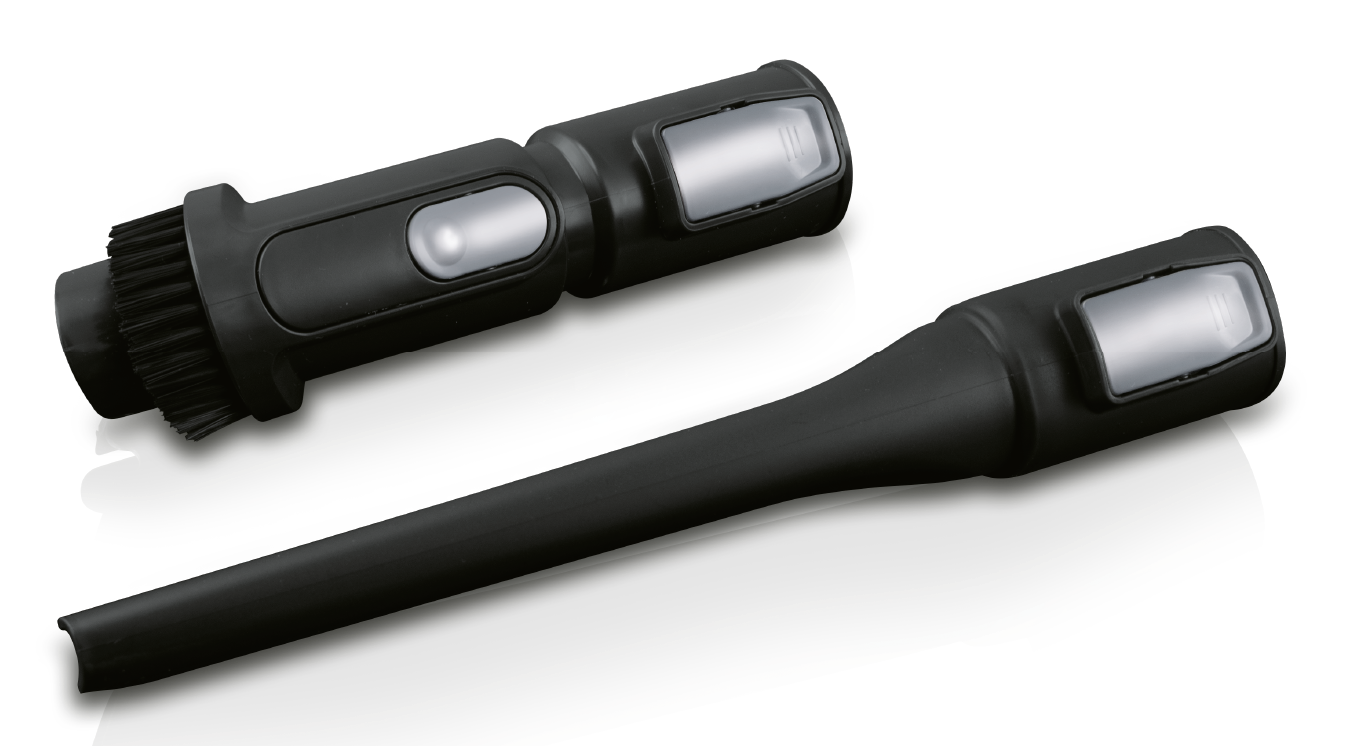 Dwa czarne akcesoria do odkurzacza: szczotka i wąska końcówka.