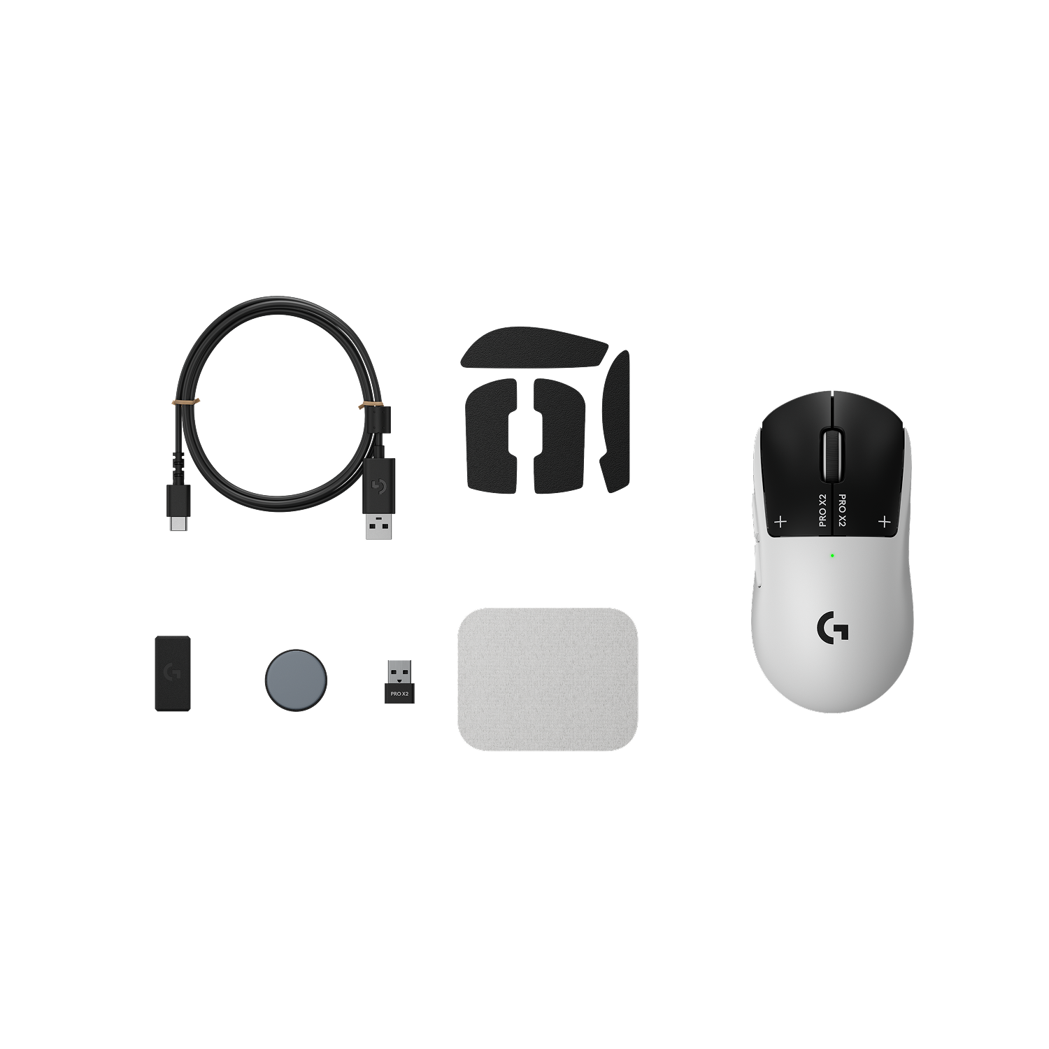 Ratón blanco con rueda negra, cable USB, dongle y cintas de agarre.