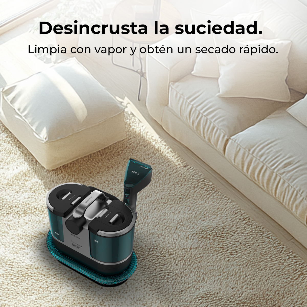 Un limpiador a vapor verde oscuro sobre alfombra clara junto a un sofá.