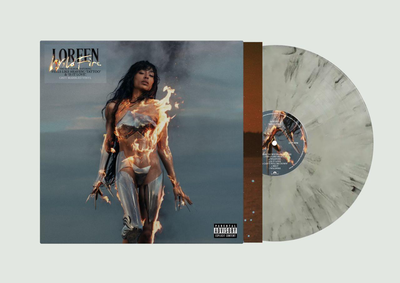 Loreen auf einem Albumcover mit Flammen, daneben eine graue Marmor-Schallplatte.