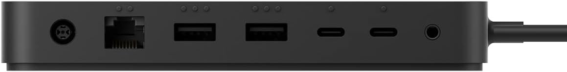 Puerto de acoplamiento negro con conexiones: alimentación, Ethernet, USB-A, USB-C y jack de audio.