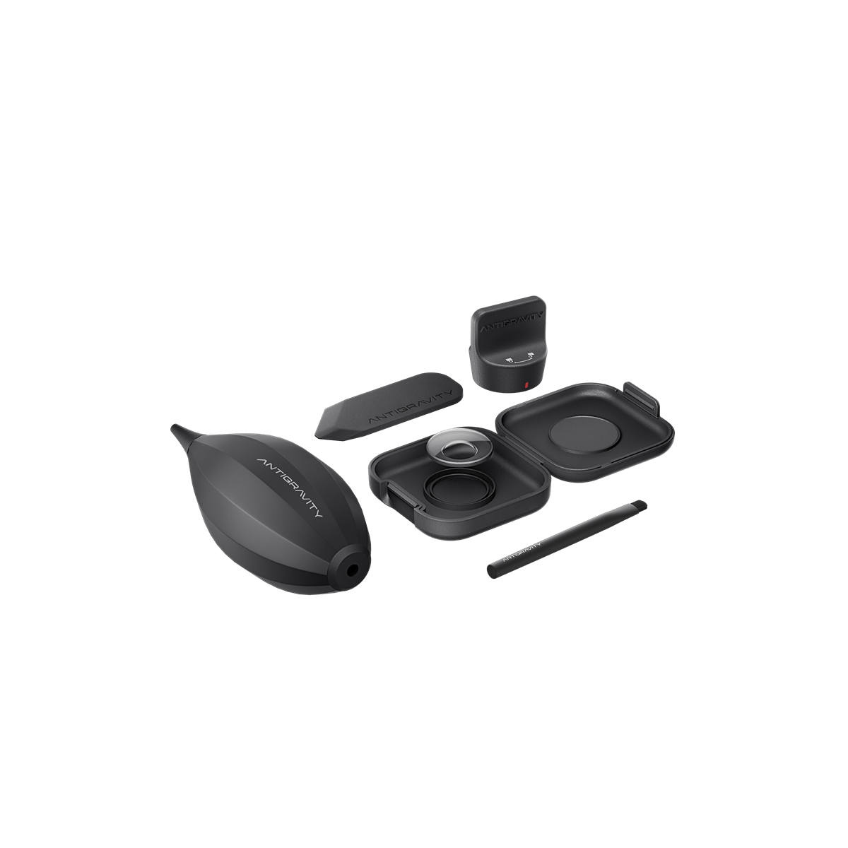 Kit de limpieza Antigravity negro: fuelle, cepillo, estuche, bolígrafo y base de carga.