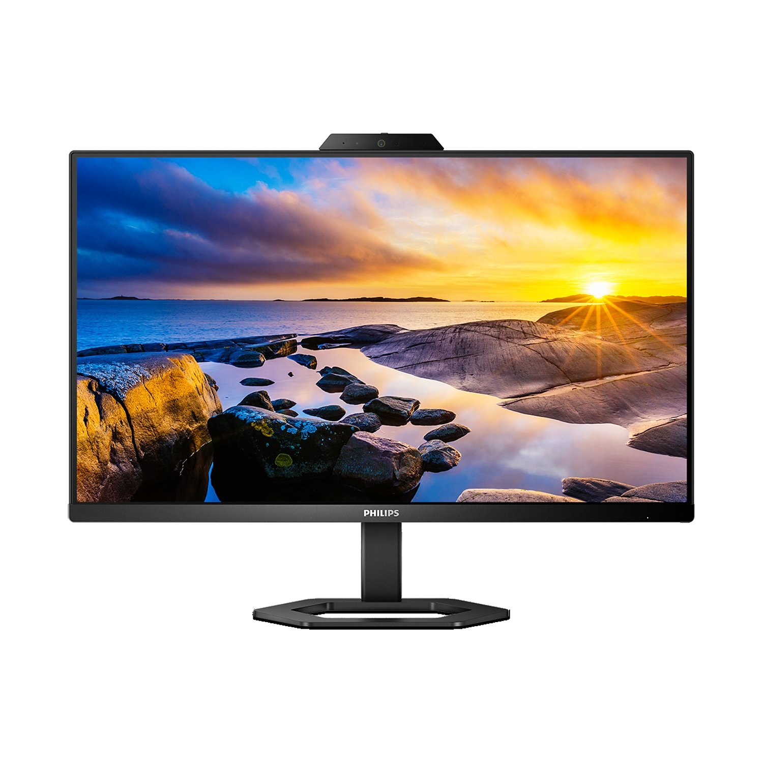Un monitor Philips nero mostra una scena al tramonto con rocce e acqua.