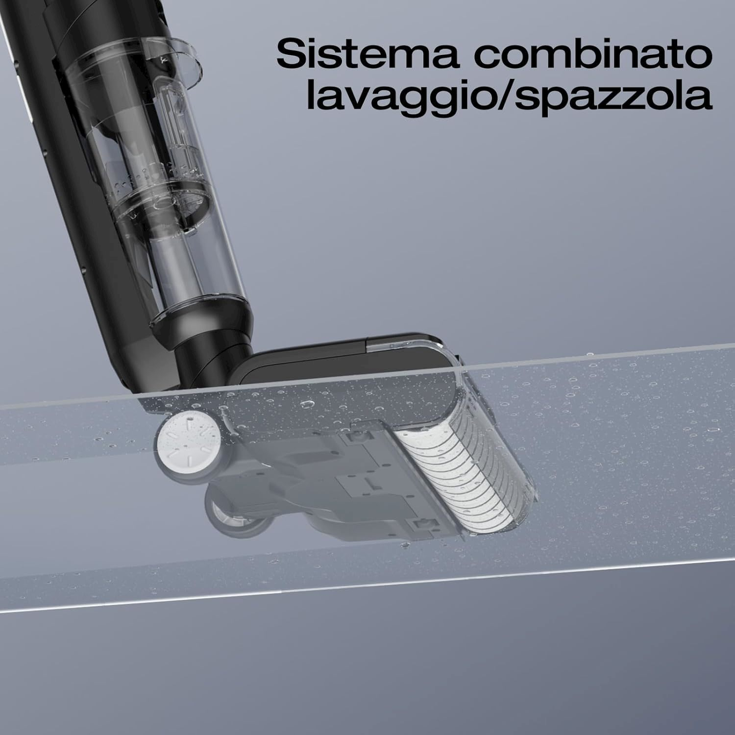 Una testina aspirapolvere nera con spazzola e gocce d'acqua su una superficie trasparente.