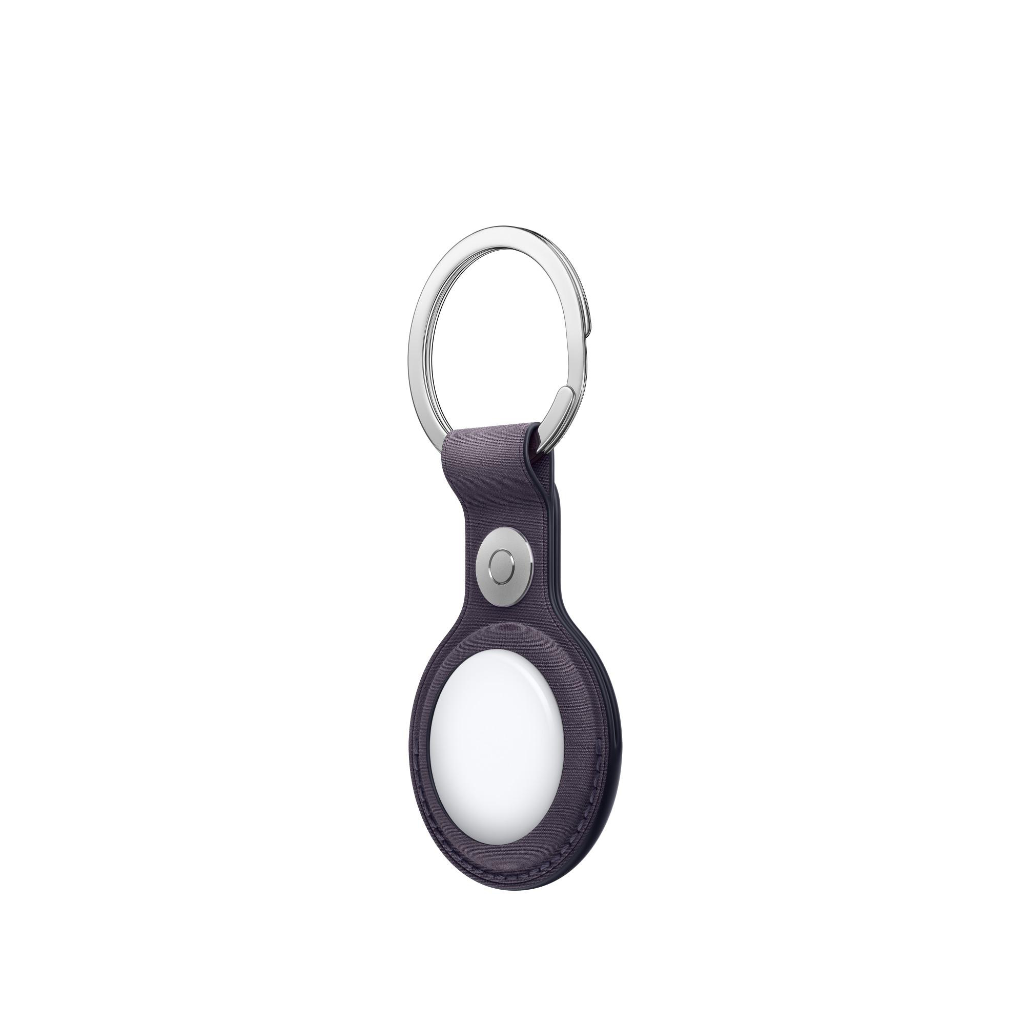 Dunkelgraues Schlüsselanhänger-Etui mit silbernem Ring und weißer Mitte.