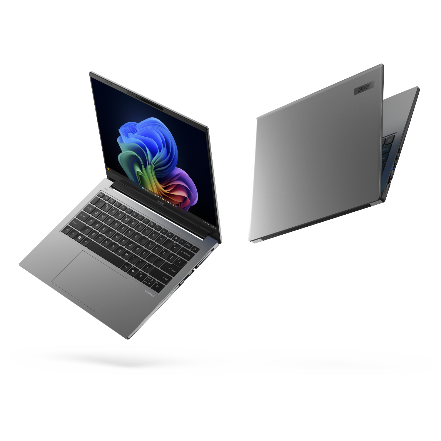 Two silver Acer laptops float. One is open, the other is closed.