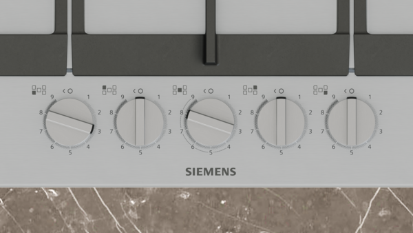Siemens ocak, dört düğmeli, altında mermer yüzeyli.