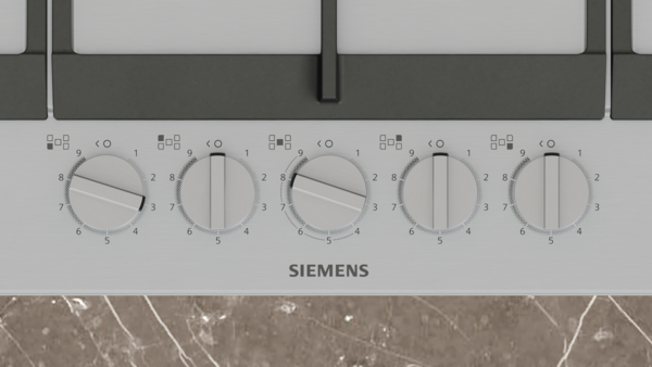 Siemens ocak, ikisi ayarlanmış beş kontrol düğmeli.